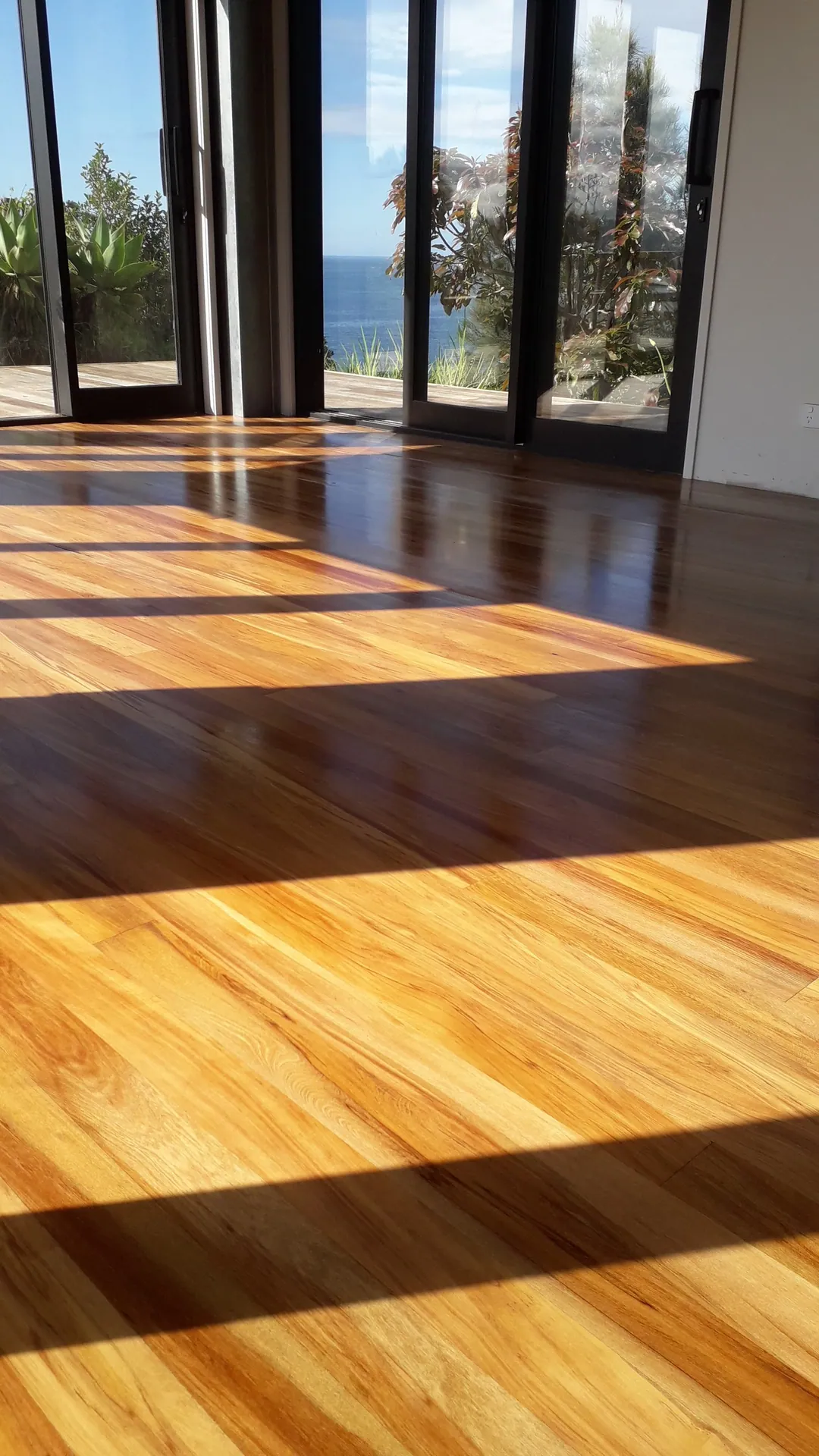 Glossy golden floor in morning sun.