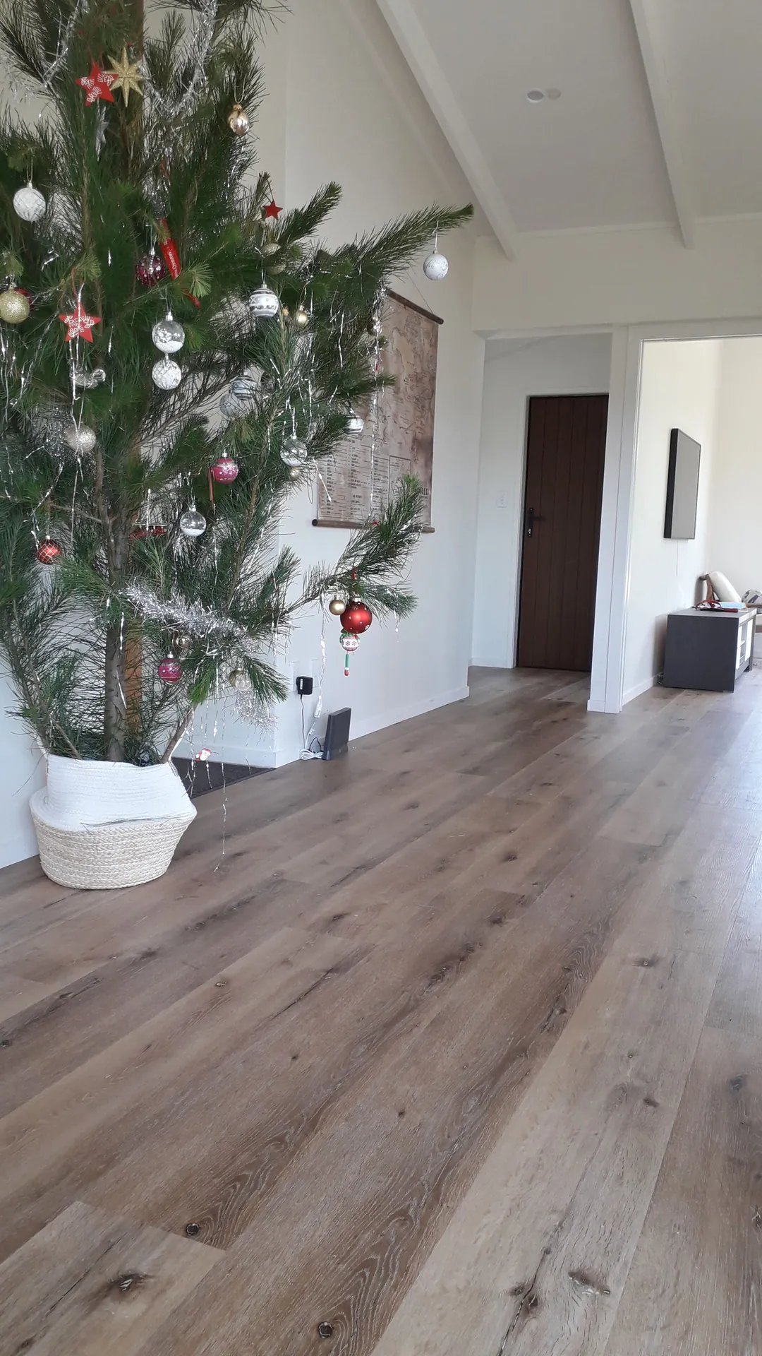 Grey oak floor in a living room at Christmas.