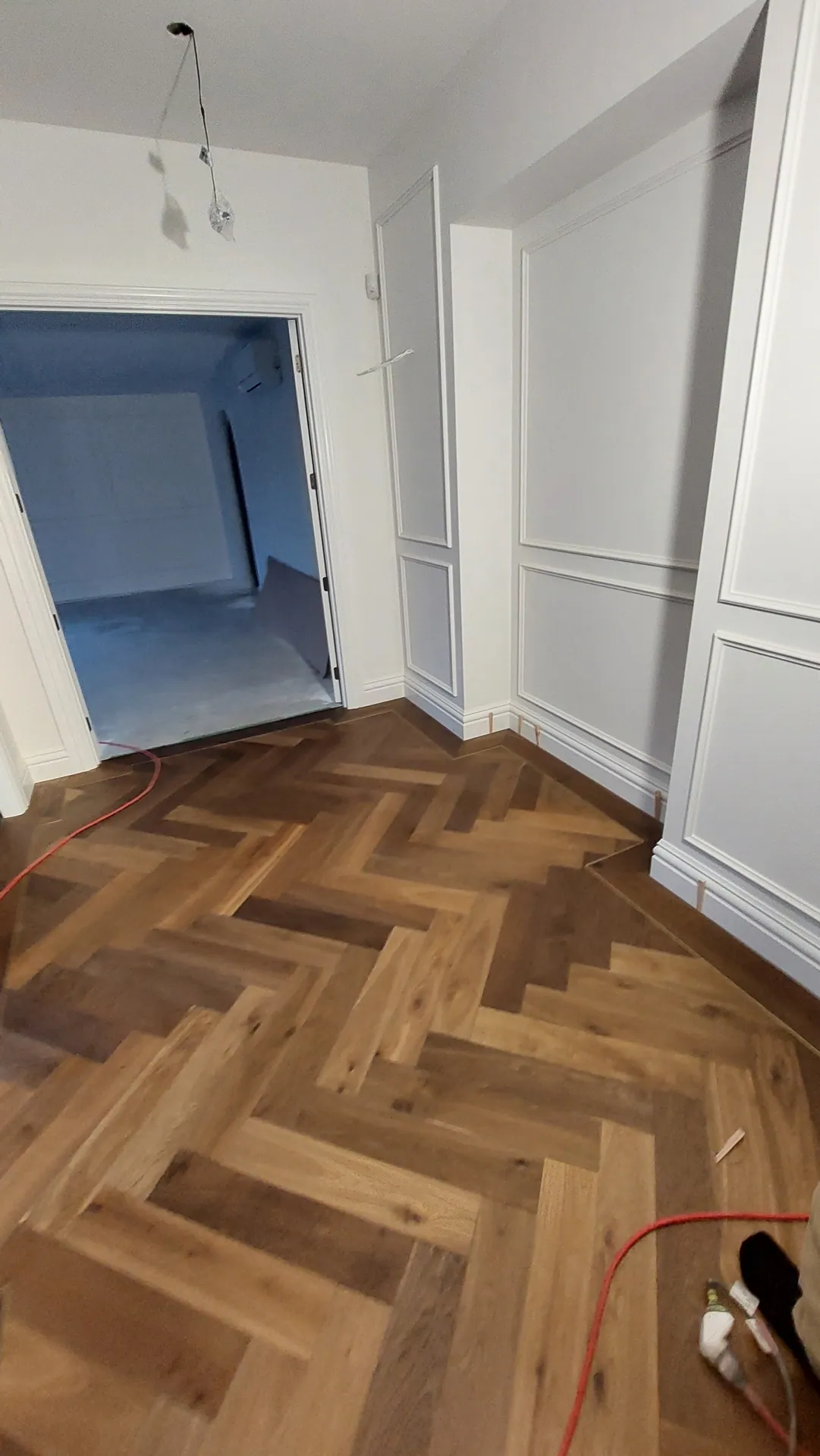 Herringbone oak in a doorway.